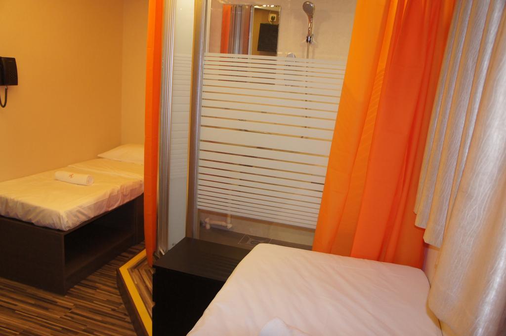 Homy Inn North Point Hongkong Rum bild